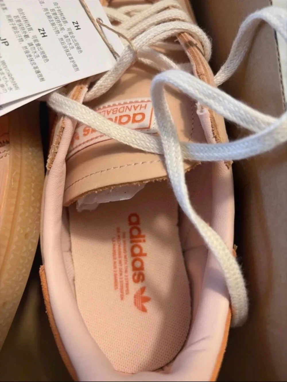 adidas Handball Spezial Sneakers in Pink and Orange